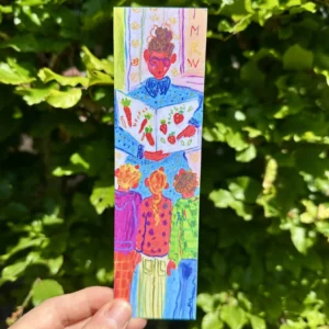 Juffie legt de kinderen wat uit over groenten en fruit. Wat ziet dat er heerlijk uit, die wortels en aardbeien!